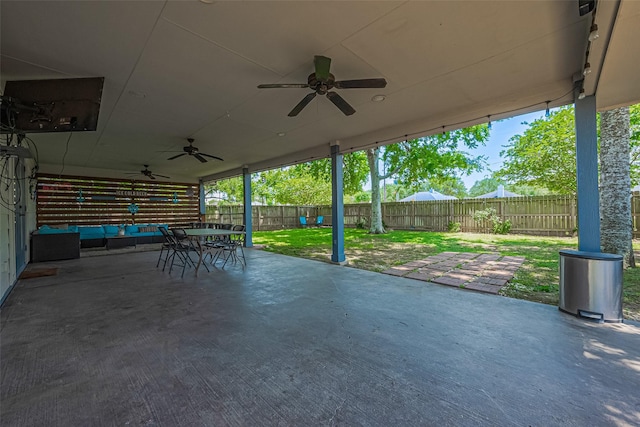 3207 Pheasant Trail Dr, Sugar Land, TX 77498 - view of patio with ceiling fan, outdoor dining space, and an outdoor living space