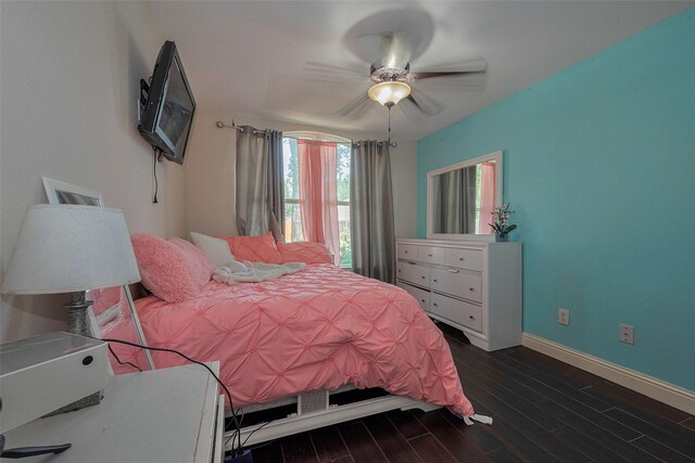 3207 Pheasant Trail Dr, Sugar Land, TX 77498 - bedroom with baseboards, dark wood finished floors, and a ceiling fan