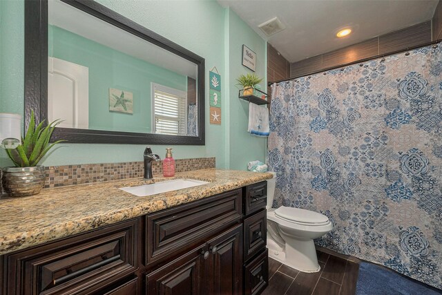 3207 Pheasant Trail Dr, Sugar Land, TX 77498 - full bathroom with toilet, vanity, wood finished floors, curtained shower, and recessed lighting