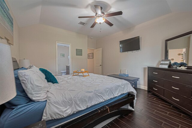 3207 Pheasant Trail Dr, Sugar Land, TX 77498 - bedroom featuring dark wood-style floors, vaulted ceiling, ensuite bathroom, ceiling fan, and baseboards