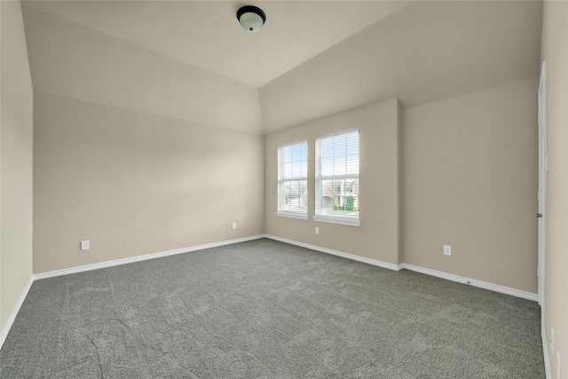 2108 Asbury Ct, Pearland, TX 77581 - spare room with dark carpet, baseboards, and lofted ceiling