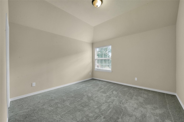 2108 Asbury Ct, Pearland, TX 77581 - unfurnished room with dark carpet, baseboards, and vaulted ceiling
