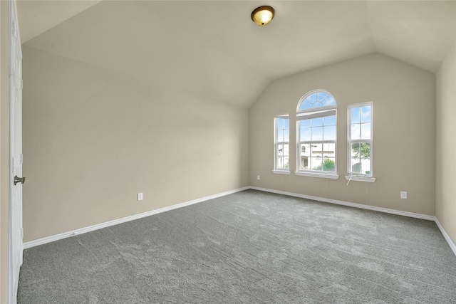 2108 Asbury Ct, Pearland, TX 77581 - additional living space featuring vaulted ceiling, dark colored carpet, and baseboards