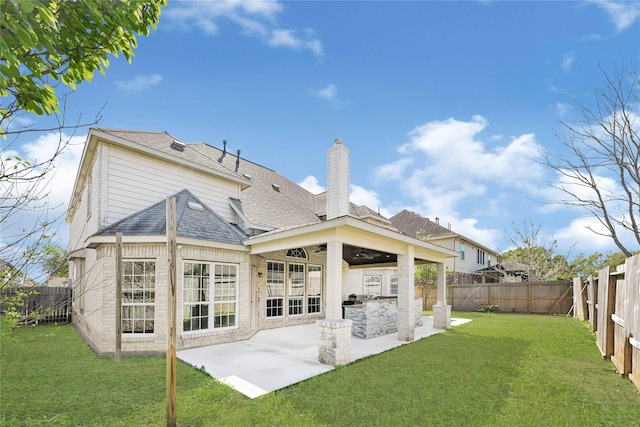 2108 Asbury Ct, Pearland, TX 77581 - rear view of house with a patio area, a chimney, a shingled roof, and ceiling fan