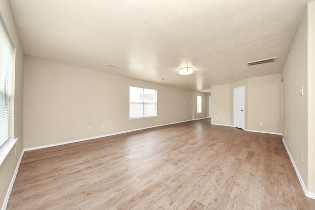 5043 Canyon Blanco Dr, Houston, TX 77045 - empty room featuring light wood finished floors and baseboards
