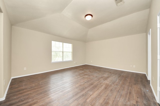 5043 Canyon Blanco Dr, Houston, TX 77045 - bonus room featuring vaulted ceiling, wood finished floors, and baseboards