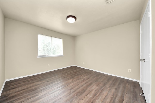 5043 Canyon Blanco Dr, Houston, TX 77045 - empty room with dark wood-style floors and baseboards