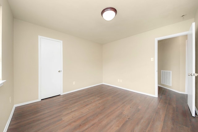 5043 Canyon Blanco Dr, Houston, TX 77045 - unfurnished room with dark wood-style floors and baseboards