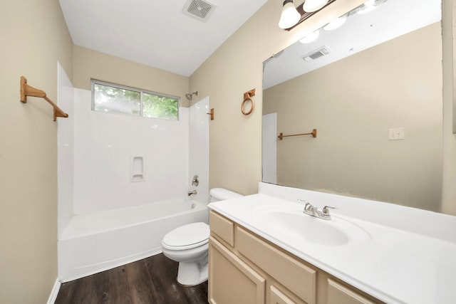 5043 Canyon Blanco Dr, Houston, TX 77045 - bathroom featuring toilet, wood finished floors,  shower combination, and vanity
