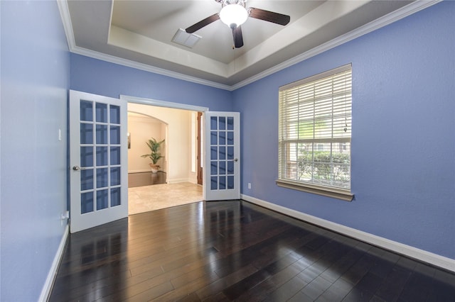 28015 Heritage Stream Dr, Katy, TX 77494 - empty room with french doors, a raised ceiling, wood finished floors, and ornamental molding