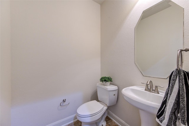 28015 Heritage Stream Dr, Katy, TX 77494 - bathroom featuring toilet and baseboards