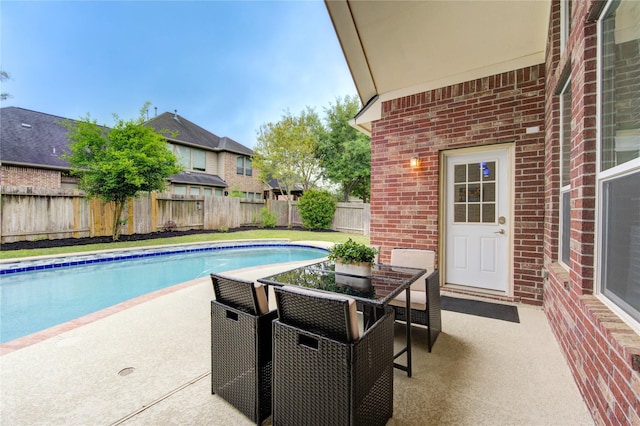 28015 Heritage Stream Dr, Katy, TX 77494 - view of pool with a patio area, a fenced backyard, and outdoor dining space