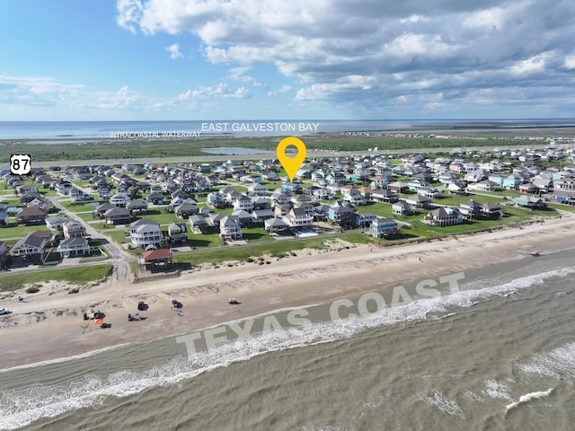 936 Surf Rd, Crystal Beach, TX 77650 - aerial perspective of suburban area featuring expansive coastline