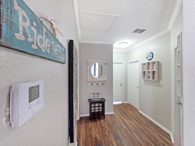 936 Surf Rd, Crystal Beach, TX 77650 - foyer entrance with ornamental molding, wood finished floors, and baseboards