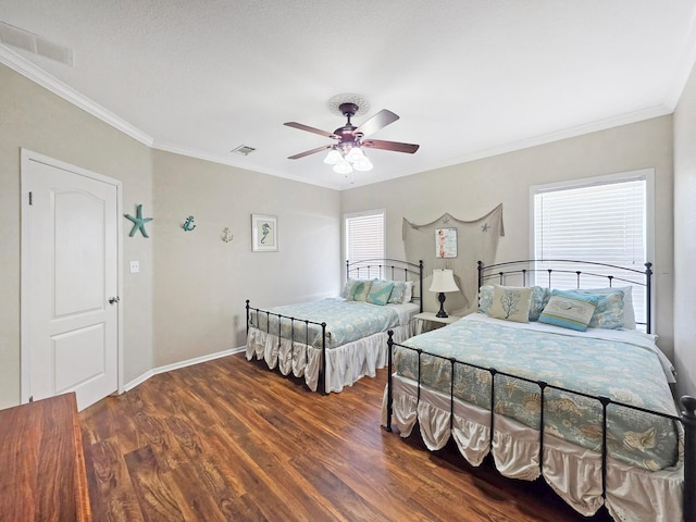 936 Surf Rd, Crystal Beach, TX 77650 - bedroom featuring wood finished floors, ornamental molding, a ceiling fan, and baseboards