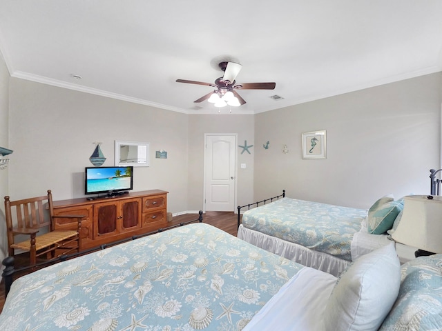 936 Surf Rd, Crystal Beach, TX 77650 - bedroom featuring wood finished floors, ornamental molding, and ceiling fan