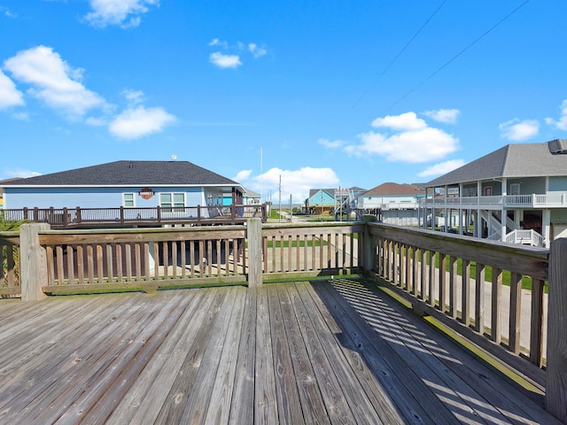936 Surf Rd, Crystal Beach, TX 77650 - wooden terrace featuring a residential view