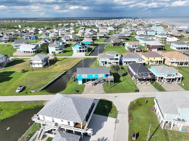 936 Surf Rd, Crystal Beach, TX 77650 - aerial perspective of suburban area with a large body of water