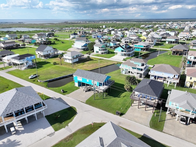 936 Surf Rd, Crystal Beach, TX 77650 - aerial perspective of suburban area with a large body of water