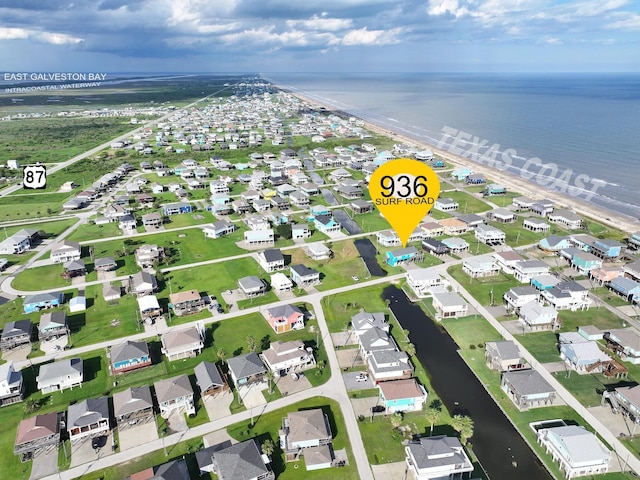 936 Surf Rd, Crystal Beach, TX 77650 - aerial perspective of suburban area with a nearby body of water