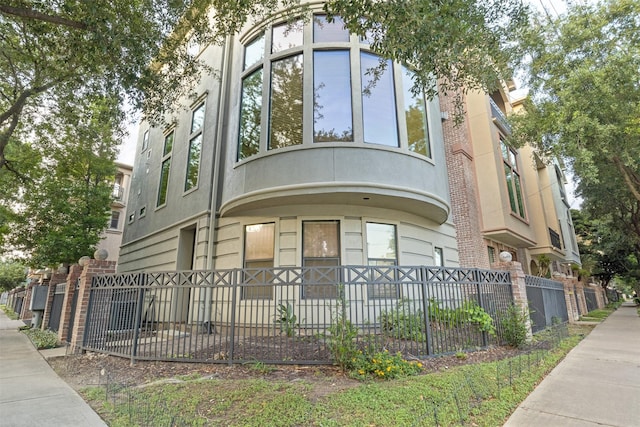 view of front of property with fence