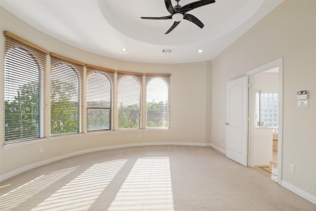 empty room with light colored carpet, healthy amount of natural light, ceiling fan, baseboards, and recessed lighting