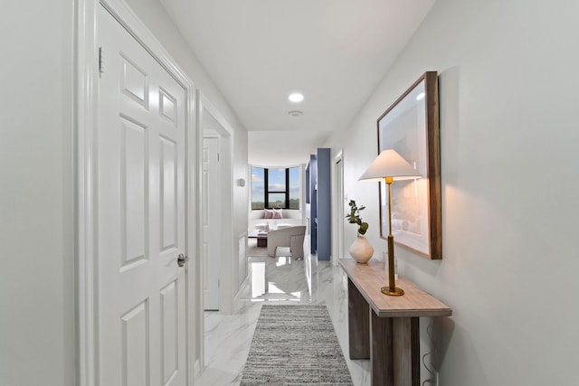 651 Bering Dr Unit 1406, Houston, TX 77057 - hallway with marble tiled floors and recessed lighting