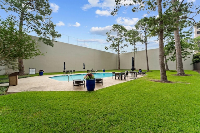 651 Bering Dr Unit 1406, Houston, TX 77057 - view of pool featuring a patio area and a lawn