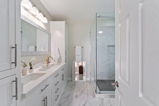 651 Bering Dr Unit 1406, Houston, TX 77057 - bathroom with a marble finish shower, double vanity, marble look tile flooring, and baseboards