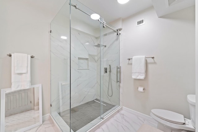 651 Bering Dr Unit 1406, Houston, TX 77057 - bathroom featuring marble look tile flooring, toilet, a marble finish shower, and baseboards