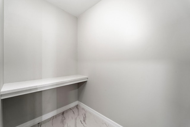 651 Bering Dr Unit 1406, Houston, TX 77057 - spacious closet featuring light marble finish floors