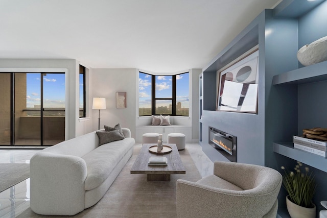 651 Bering Dr Unit 1406, Houston, TX 77057 - living area with a glass covered fireplace and marble finish floors