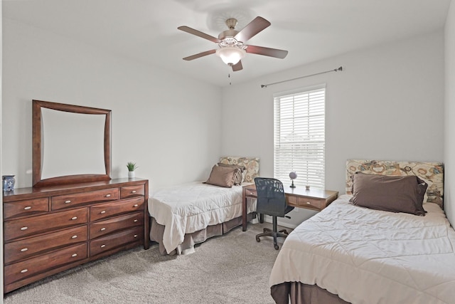 23522 Messina Harbor Dr, Katy, TX 77493 - bedroom with light colored carpet and ceiling fan