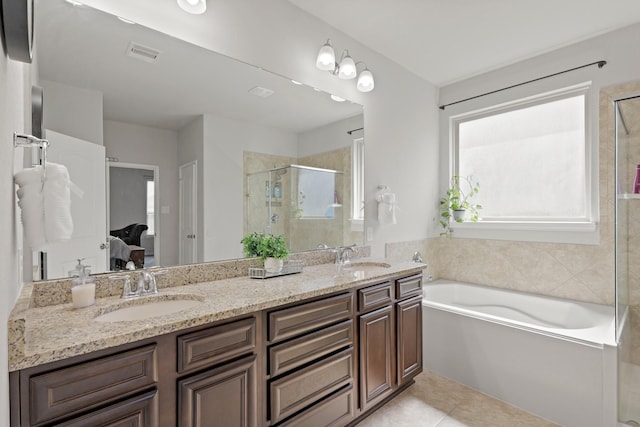 23522 Messina Harbor Dr, Katy, TX 77493 - ensuite bathroom with a shower stall, a bath, double vanity, and tile patterned flooring