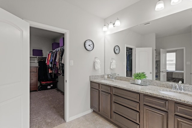 23522 Messina Harbor Dr, Katy, TX 77493 - full bath with ensuite bathroom, double vanity, and a walk in closet