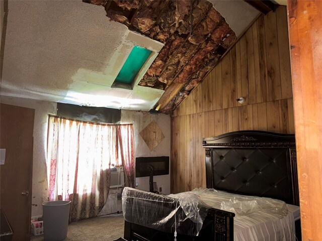9034 Everglade Dr, Houston, TX 77078 - carpeted bedroom with lofted ceiling, wood walls, and cooling unit