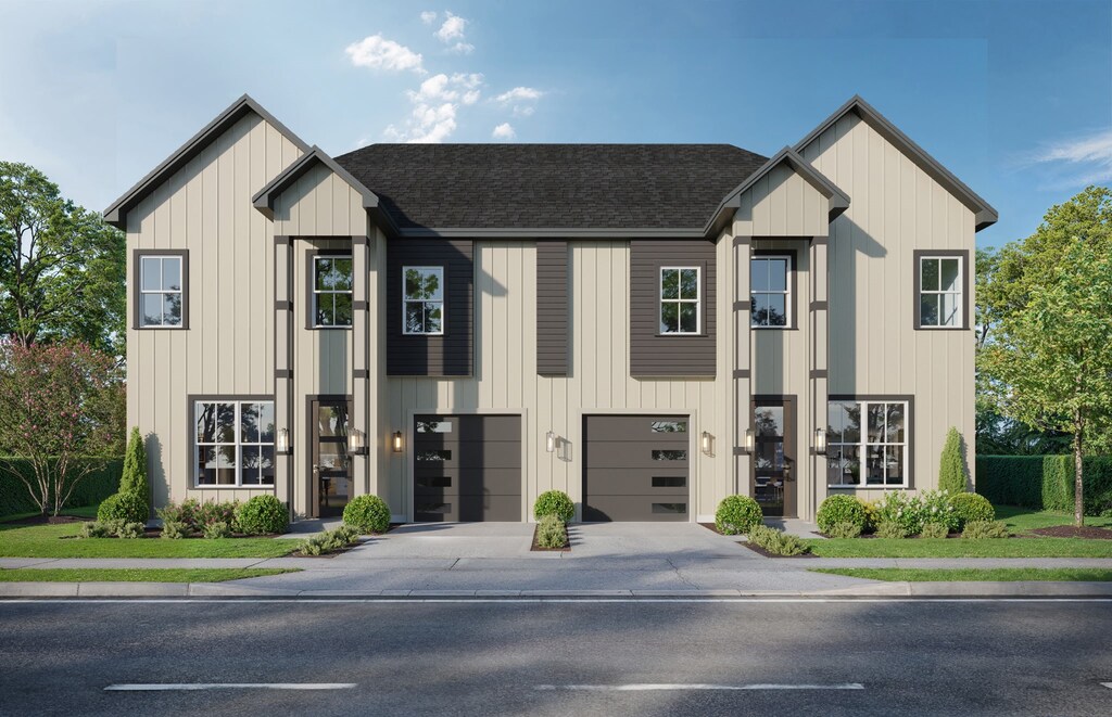 5420 Lynnfield St A/B, Unit A/B Houston, TX 77028 - modern farmhouse style home with driveway, roof with shingles, a garage, and board and batten siding