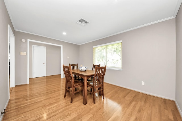 1815 Tannehill Dr, Houston, TX 77008 - dining space featuring ornamental molding, light wood-style flooring, baseboards, and recessed lighting