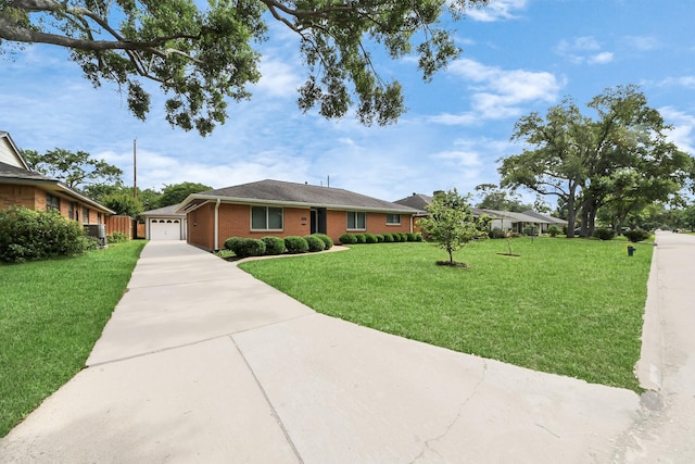 1815 Tannehill Dr, Houston, TX 77008 - single story home with driveway, a garage, a front lawn, and brick siding