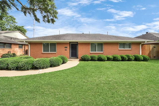 1815 Tannehill Dr, Houston, TX 77008 - single story home featuring brick siding, a front lawn, and a shingled roof