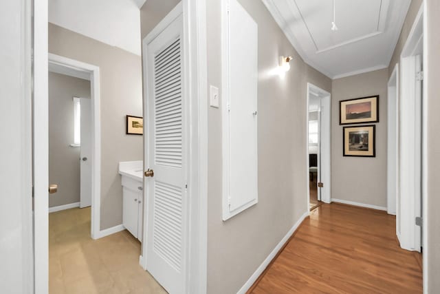 1815 Tannehill Dr, Houston, TX 77008 - hallway featuring baseboards, attic access, and light wood-style floors