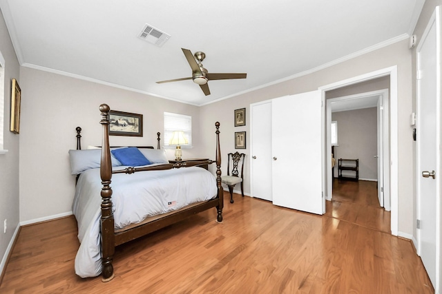 1815 Tannehill Dr, Houston, TX 77008 - bedroom with light wood-style floors, crown molding, baseboards, and a ceiling fan