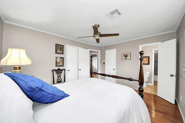 1815 Tannehill Dr, Houston, TX 77008 - bedroom featuring dark wood-style floors, ornamental molding, baseboards, a ceiling fan, and ensuite bath
