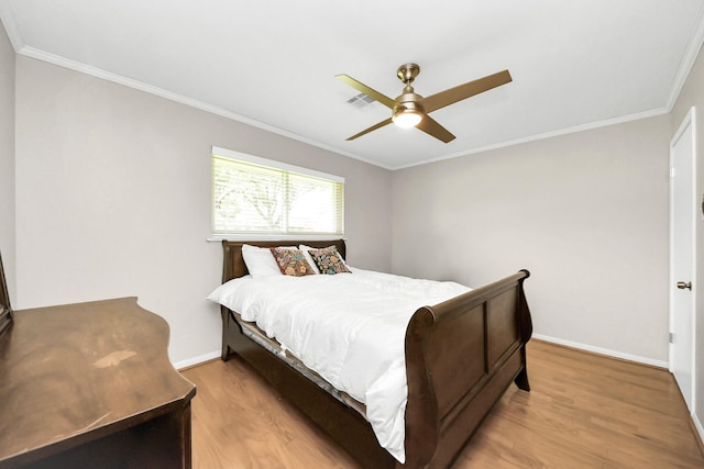 1815 Tannehill Dr, Houston, TX 77008 - bedroom featuring light wood-style flooring, crown molding, baseboards, and ceiling fan
