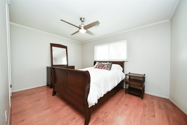1815 Tannehill Dr, Houston, TX 77008 - bedroom featuring ornamental molding, light wood-style flooring, baseboards, and a ceiling fan