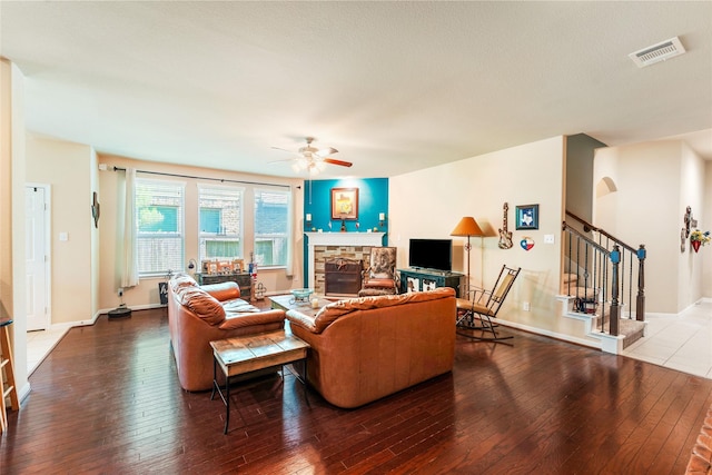 9967 Manor Spring Ln, Brookshire, TX 77423 - living room featuring hardwood / wood-style flooring, a ceiling fan, a fireplace, and stairway