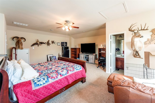 9967 Manor Spring Ln, Brookshire, TX 77423 - bedroom with light carpet, attic access, a ceiling fan, and ensuite bath