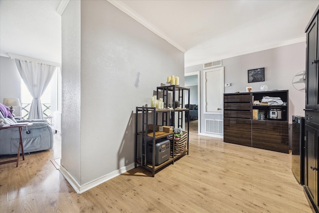 2333 Bering Dr Unit 236, Houston, TX 77057 - hallway with ornamental molding, light wood-type flooring, and baseboards