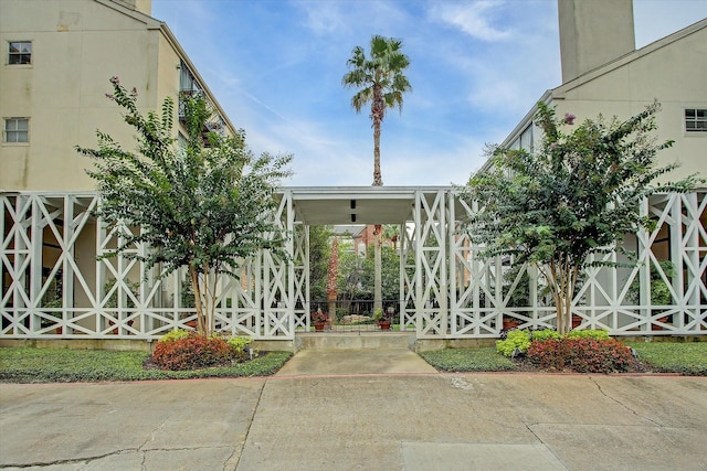 2333 Bering Dr Unit 236, Houston, TX 77057 - property entrance with a chimney and fence