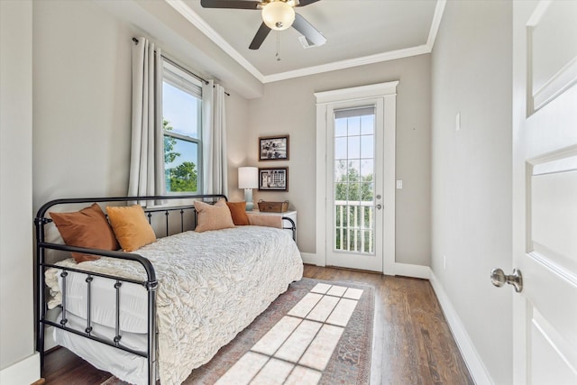 1004 Enid St Unit B, Houston, TX 77009 - bedroom with access to exterior, multiple windows, wood finished floors, crown molding, and baseboards